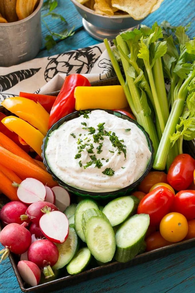 Homemade Ranch Dip Recipe | Homemade Ranch Powder | Homemade Ranch Dressing | Best Ranch Dip #ranch #dip #appetizer #snack #sraye A bowl of homemade ranch dip surrounded by fresh vegetables.