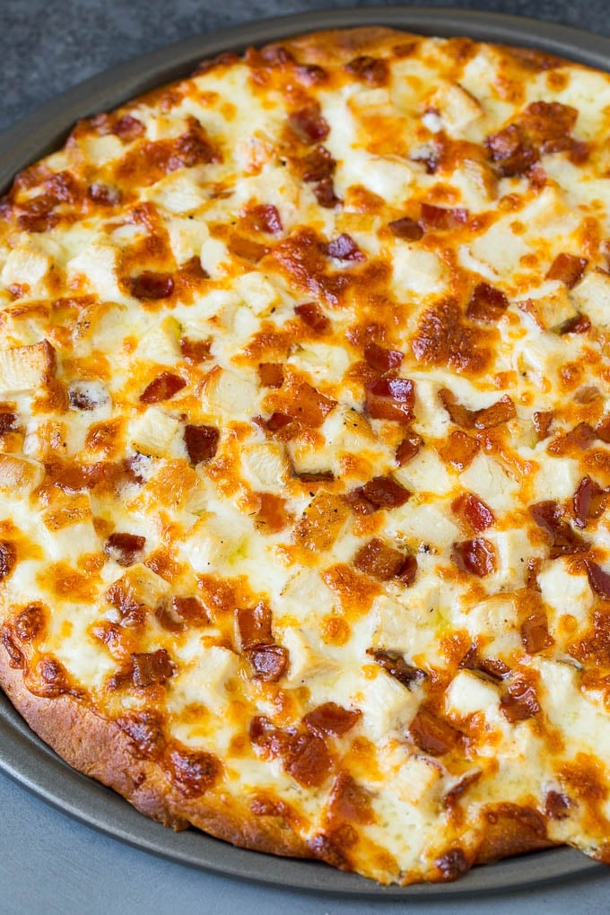 Chicken Alfredo Pizza Recipe #pizza #chicken #bacon #dinner #sraye A baked crust topped with melted cheese and meat.