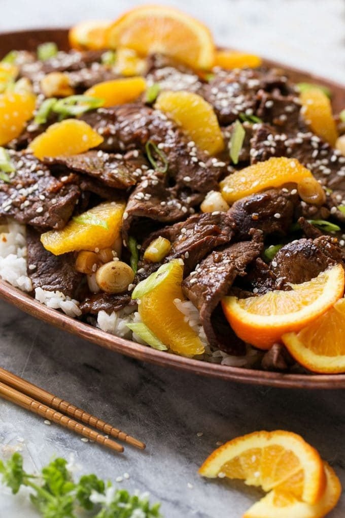 Orange Beef Stir Fry Recipe | 4 Ingredient Orange Beef | Easy Orange Beef #orange #beef #stirfry #asian #dinner #sraye A platter of beef in orange sauce.