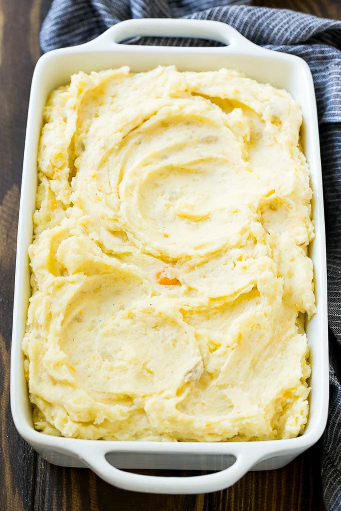 Loaded Mashed Potato Casserole Recipe | Loaded Potatoes | Bacon Mashed Potatoes | Thanksgiving Mashed Potatoes #potatoes #bacon #cheese #casserole #Thanksgiving #dinner #sraye Mashed potatoes in a baking dish.