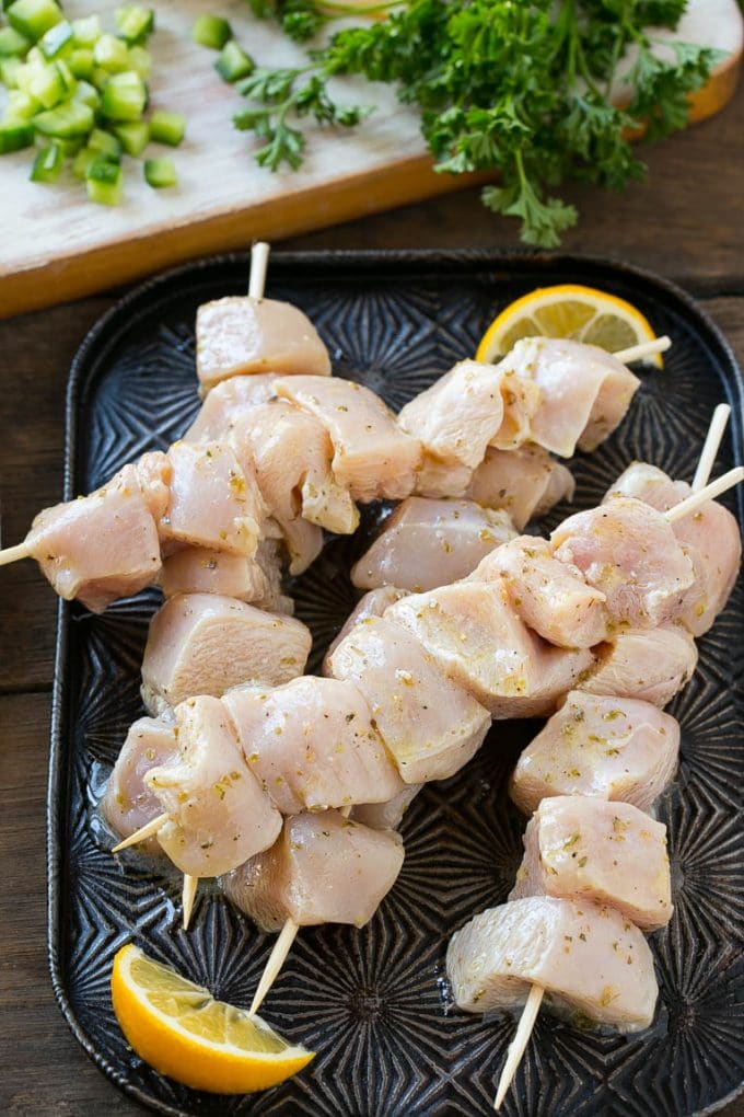 Greek Chicken Souvlaki Recipe | Easy Greek Chicken | Chicken Souvlaki | Greek Chicken Skewers | Easy Greek Chicken Skewers #chicken #kabobs #glutenfree #keto #lowcarb #grilling #sraye Chunks of marinated chicken breast threaded onto skewers to be grilled.