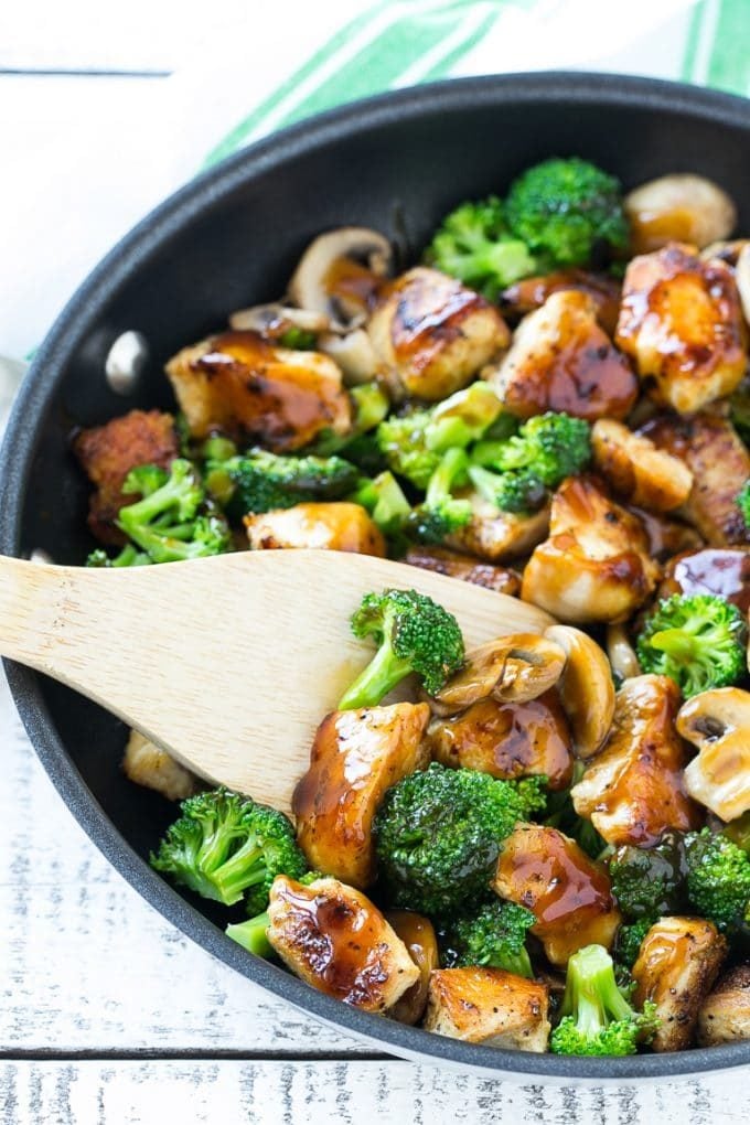 Chicken and Broccoli Stir Fry Recipe | Chicken Stir Fry | Healthy Chicken Recipe | Chicken and Broccoli | Chinese Food #chicken #broccoli #stirfry #healthy #cleaneating #dinner #sraye A stir fry of chicken, broccoli and mushrooms in a skillet with a spatula.