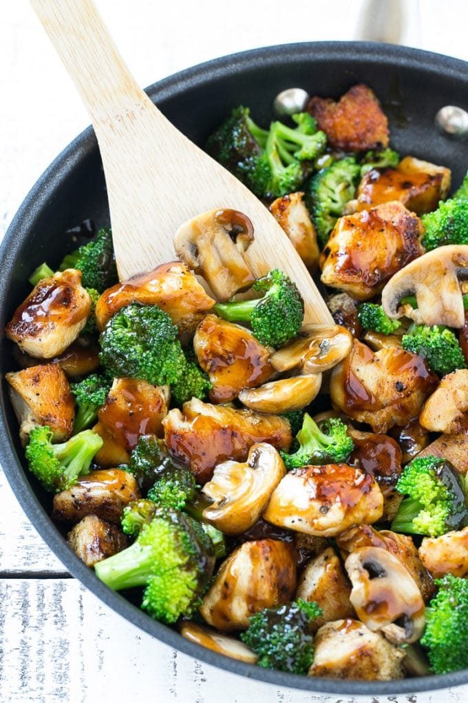 Chicken and Broccoli Stir Fry Recipe | Chicken Stir Fry | Healthy Chicken Recipe | Chicken and Broccoli | Chinese Food #chicken #broccoli #stirfry #healthy #cleaneating #dinner #sraye Chicken and broccoli stir fry with mushrooms in a skillet with a spatula.
