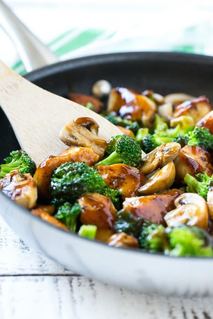 Chicken and Broccoli Stir Fry Recipe | Chicken Stir Fry | Healthy Chicken Recipe | Chicken and Broccoli | Chinese Food #chicken #broccoli #stirfry #healthy #cleaneating #dinner #sraye A pan of chicken and broccoli stir fry with a spatula in it.