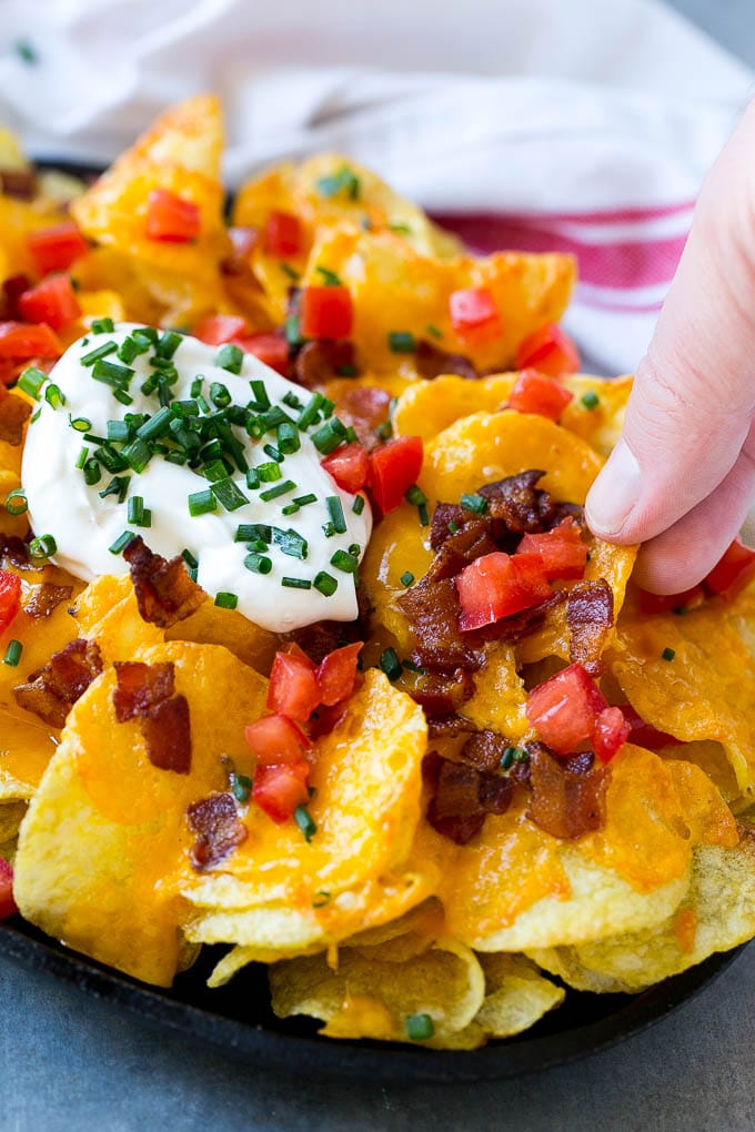 Irish Nachos Recipe | Potato Nachos | Potato Chip Recipe | Appetizer Recipe #nachos #potatoes #cheese #bacon #appetizer #sraye Irish nachos loaded with cheese, bacon, sour cream, tomatoes and chives.
