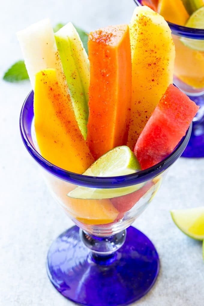 Mexican Fruit Cups | Fruit Cups | Mexican Fruit | Tropical Fruit #fruit #fruitcup #watermelon #pineapple #snack #healthy #sraye Fruit cups filled with watermelon, cucumber, papaya and mango.