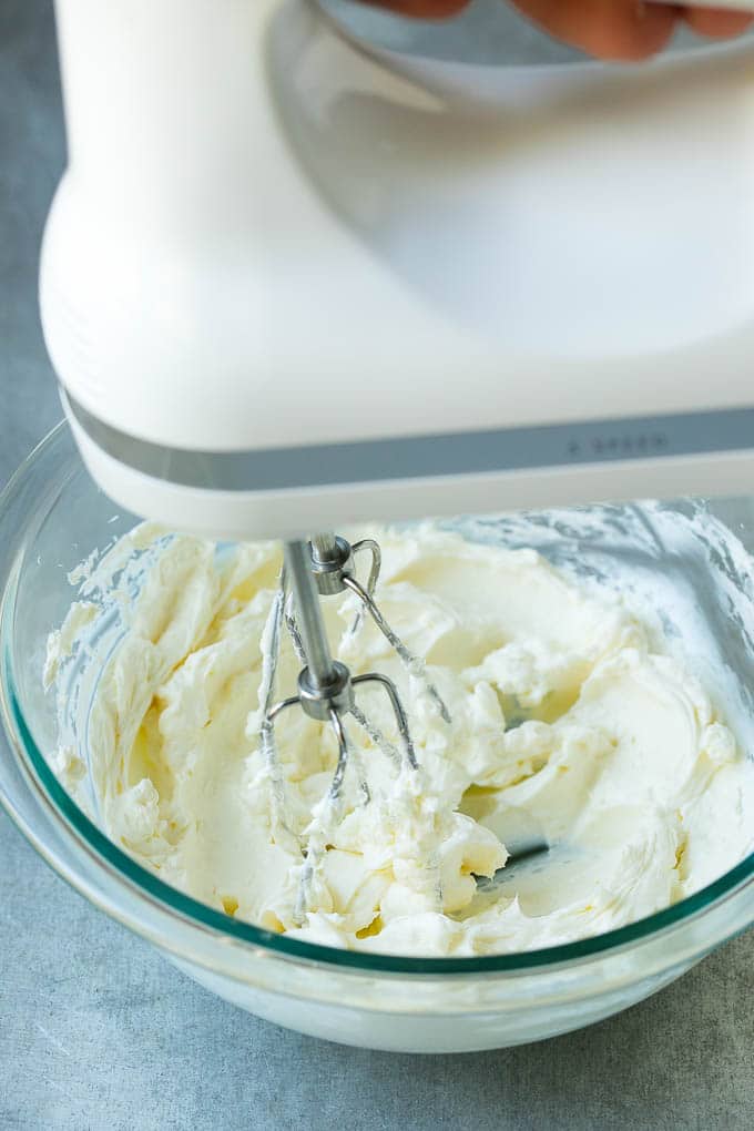 Cream Cheese Fruit Dip | Fruit Recipe | Fruit Dip #fruit #dip #creamcheese #snack #dessert #sraye A mixer whipping up cream cheese for fruit dip.
