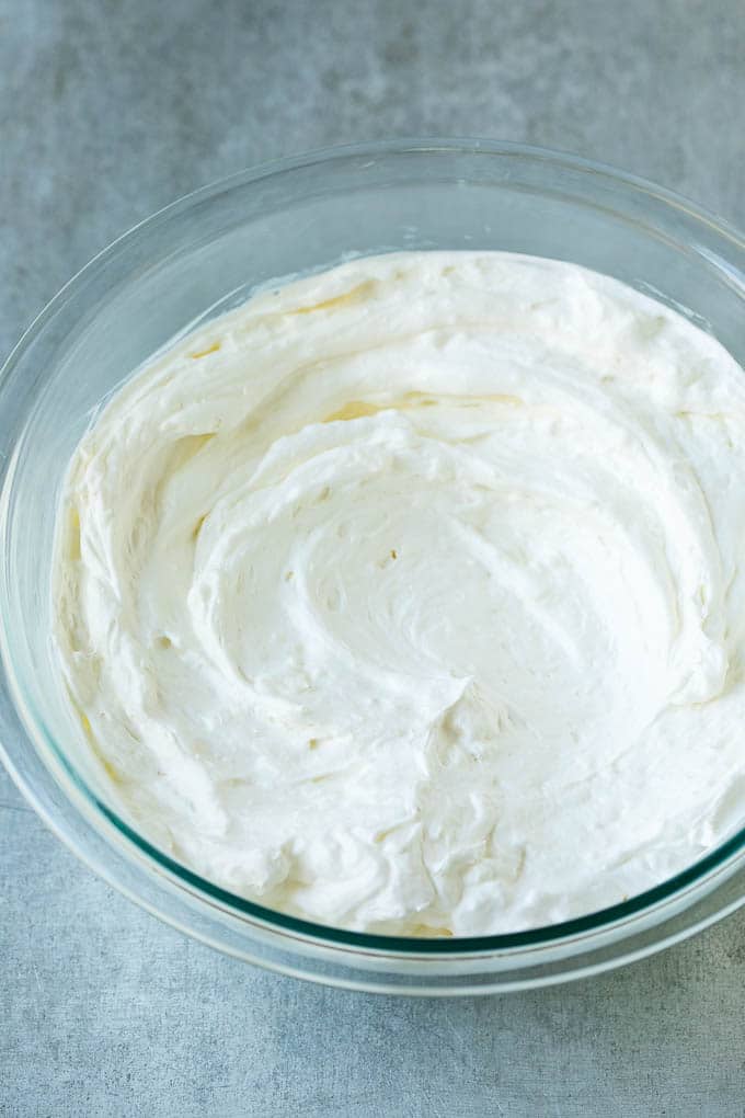 Cream Cheese Fruit Dip | Fruit Recipe | Fruit Dip #fruit #dip #creamcheese #snack #dessert #sraye Cream cheese, marshmallow cream and whipped topping in a mixing bowl.