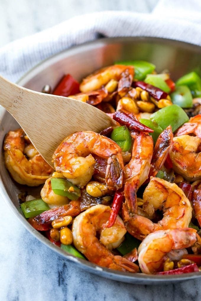 Kung Pao Shrimp | Shrimp Recipe | Shrimp Stir Fry | Easy Shrimp Recipe #shrimp #stirfry #peppers #dinner #sraye #spicy A serving spatula in a pan of Kung Pao shrimp.