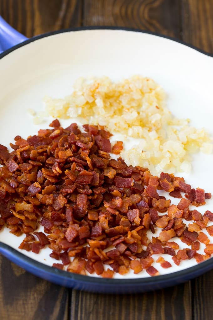 Butternut Squash Pasta Recipe #pasta #squash #bacon #fall #dinner #sraye Bacon, onions and garlic in a skillet.