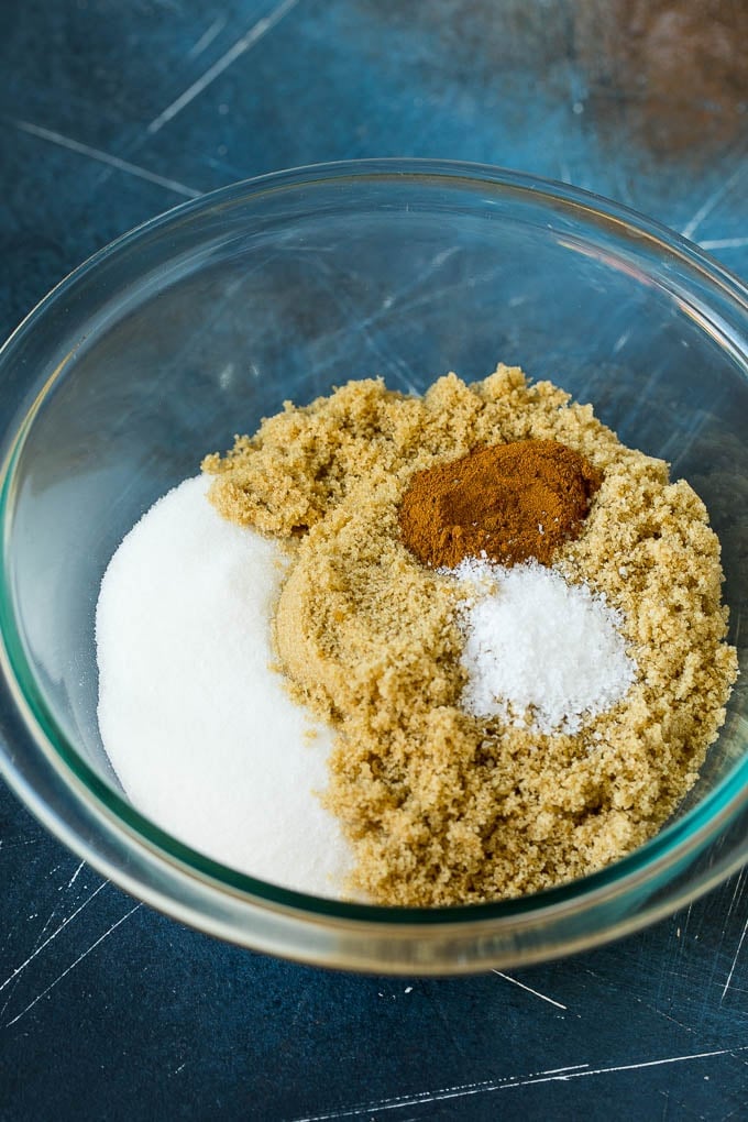 Candied Pecans Recipe | Glazed Pecans | Sugared Pecans #pecans #nuts #snack #dessert #sraye Granulated sugar, brown sugar, cinnamon and salt in a bowl.