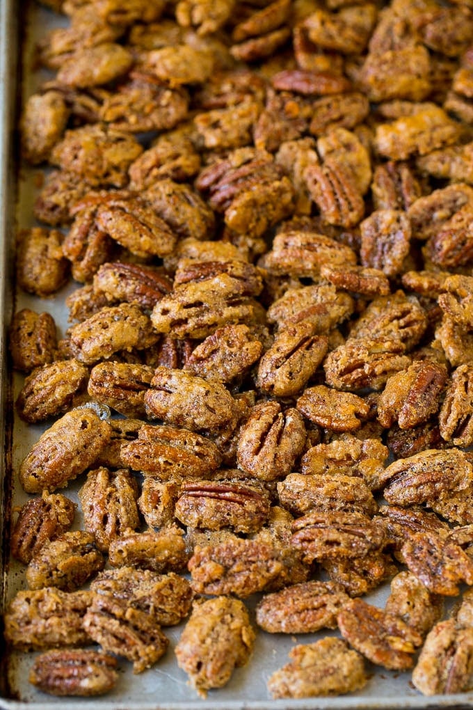 Candied Pecans Recipe | Glazed Pecans | Sugared Pecans #pecans #nuts #snack #dessert #sraye Cooked glazed nuts on a sheet pan.