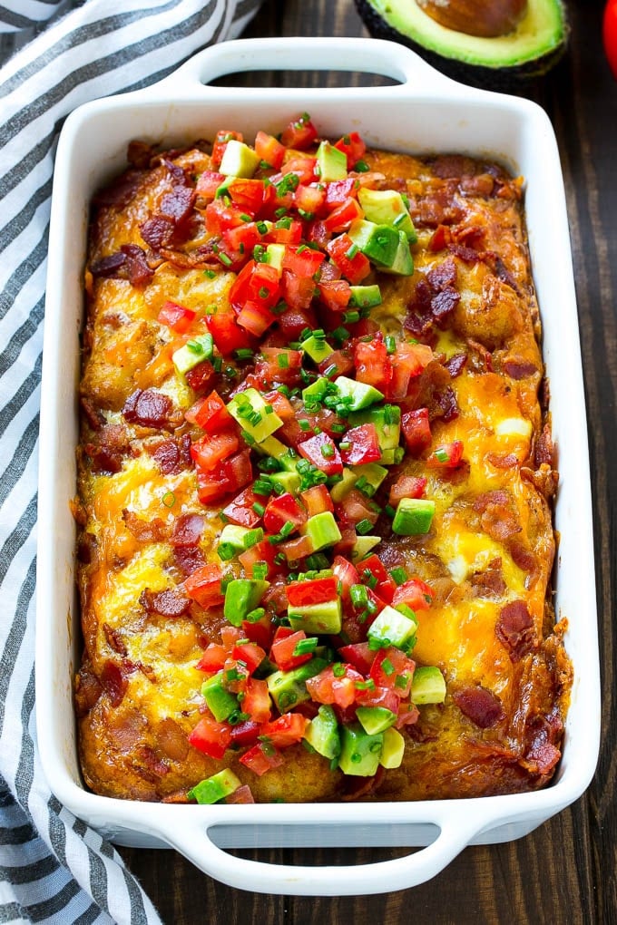 Breakfast Casserole with Bacon Recipe | Bacon and Egg Casserole | Egg Casserole with Bacon | Bacon Breakfast Casserole #eggs #bacon #casserole #breakfast #brunch #sraye A breakfast casserole with bacon that is topped with avocado and tomato.