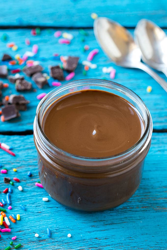 Homemade Magic Shell Recipe | Chocolate Ice Cream Topping | Chocolate Sauce | Hard Chocolate Coating #chocolate #icecream #dessert #sraye A jar of chocolate chocolate shell.