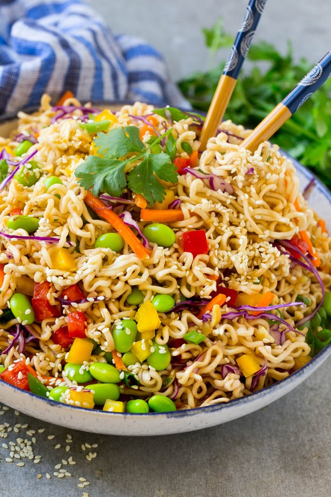 Asian Noodle Salad Recipe | Ramen Noodle Salad | Asian Salad #salad #noodles #edamame #vegetarian #sraye #lunch Asian noodle salad with ramen noodles, edamame, bell peppers and carrots in a sesame dressing.