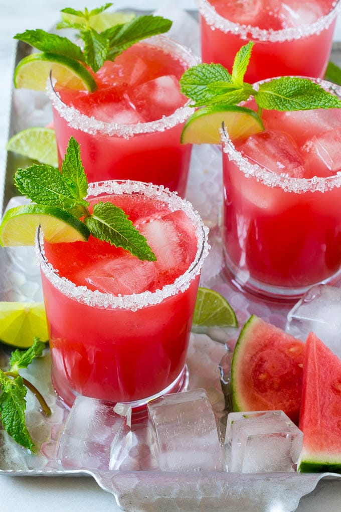 Watermelon Agua Fresca | Watermelon Drink | Agua Fresca Recipe #watermelon #aguafresca #watermelondrink #drink #sraye #summer Watermelon agua fresca in sugar rimmed glasses with lime and mint for garnish.