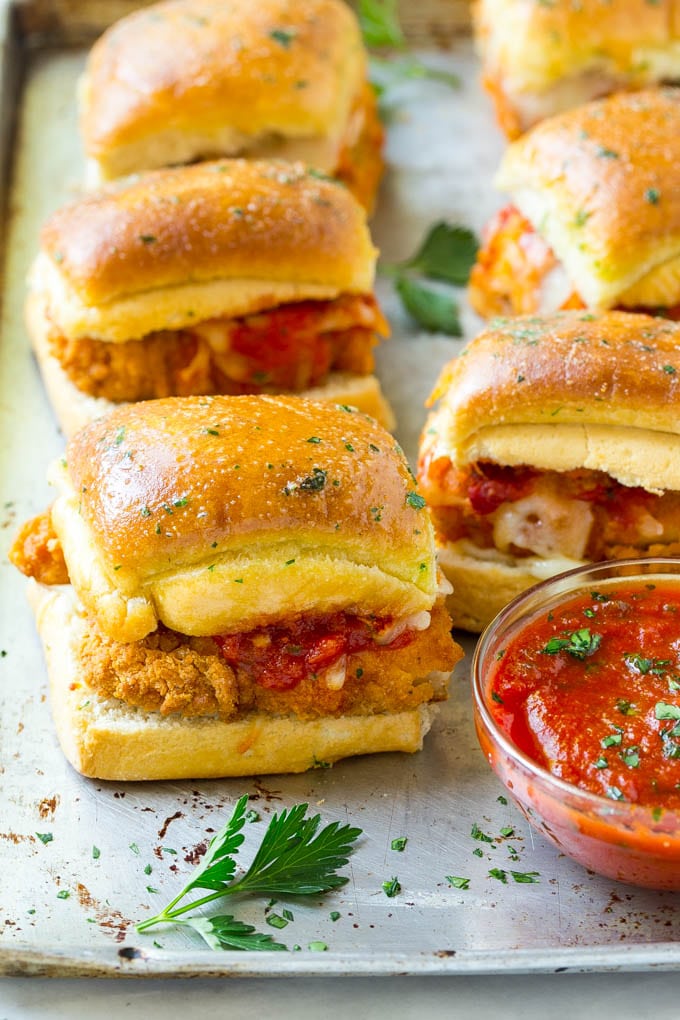 Chicken Parmesan Sliders | Chicken Parmesan Sandwich Recipe | Slider Sandwich Recipe #sliders #chickenparm #chickenparmesan #chickenparmesansliders #dinner #appetizer #sraye Chicken parmesan sliders made with crispy chicken, marinara sauce and cheese on buns.