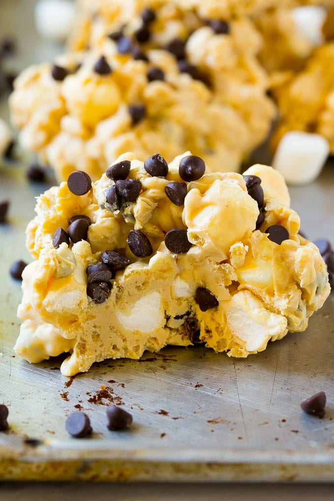 Avalanche Cookies Recipe | No Bake Cookie Recipe | Easy Cookie Recipe | Avalanche Bark #bark #avalanche #avalanchecookies #cookies #nobakecookies #nobake #dessert #sraye A close up of an avalanche cookie with a bite taken out of it.