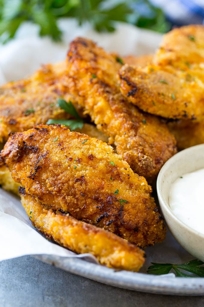 Baked Fried Chicken Recipe | Oven Fried Chicken | Baked Chicken Fingers | Crispy Chicken Fingers #chicken #friedchicken #bakedchicken #ovenfriedchicken #chickenfingers #dinner #sraye Baked oven fried chicken fingers in a dish with a side of ranch dressing.
