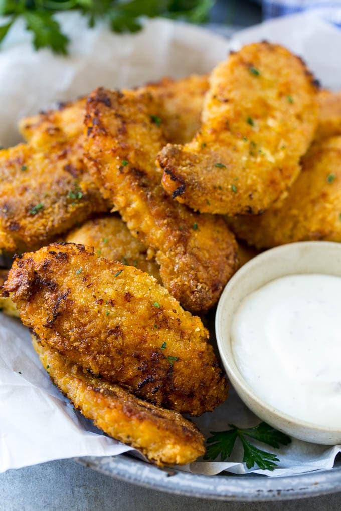 Baked Fried Chicken Recipe | Oven Fried Chicken | Baked Chicken Fingers | Crispy Chicken Fingers #chicken #friedchicken #bakedchicken #ovenfriedchicken #chickenfingers #dinner #sraye Crispy baked fried chicken fingers on a plate with ranch dip.