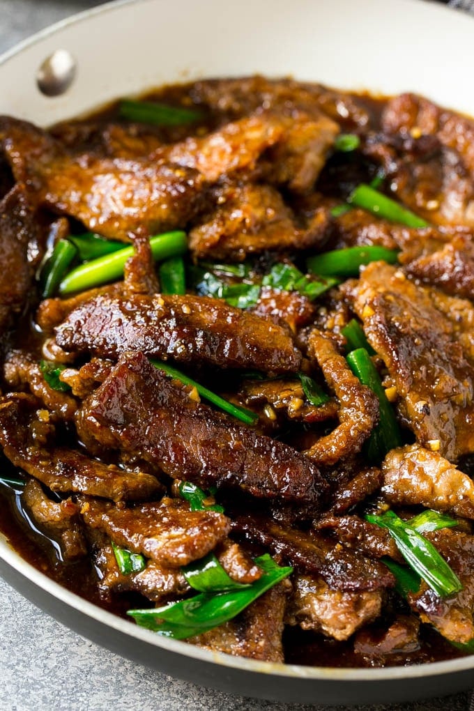 Mongolian Beef Recipe | Asian Beef Recipe | Chinese Beef | Beef Stir Fry #Chinese #Mongolian #Asian #mongolianbeef #beef #sraye #dinner A pan full of Mongolian beef with green onions.
