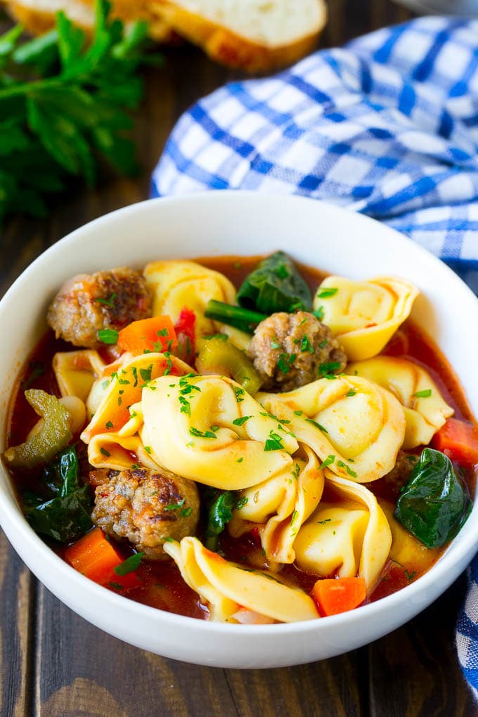 Tortellini Soup Recipe | Sausage Soup | Italian Soup #soup #sausage #pasta #tortellini #dinner #sraye A bowl of tortellini soup with sausage and vegetables.