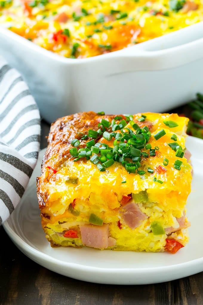 Hash Brown Egg Casserole Recipe | Breakfast Casserole with Ham | Hash Brown Casserole | Ham and Egg Casserole | Egg Casserole with Ham #casserole #breakfast #eggs #egg #hashbrown #sraye A cut slice of hash brown casserole.