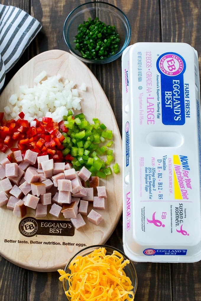 Hash Brown Egg Casserole Recipe | Breakfast Casserole with Ham | Hash Brown Casserole | Ham and Egg Casserole | Egg Casserole with Ham #casserole #breakfast #eggs #egg #hashbrown #sraye Ingredients including eggs, ham, peppers, onions and cheese.