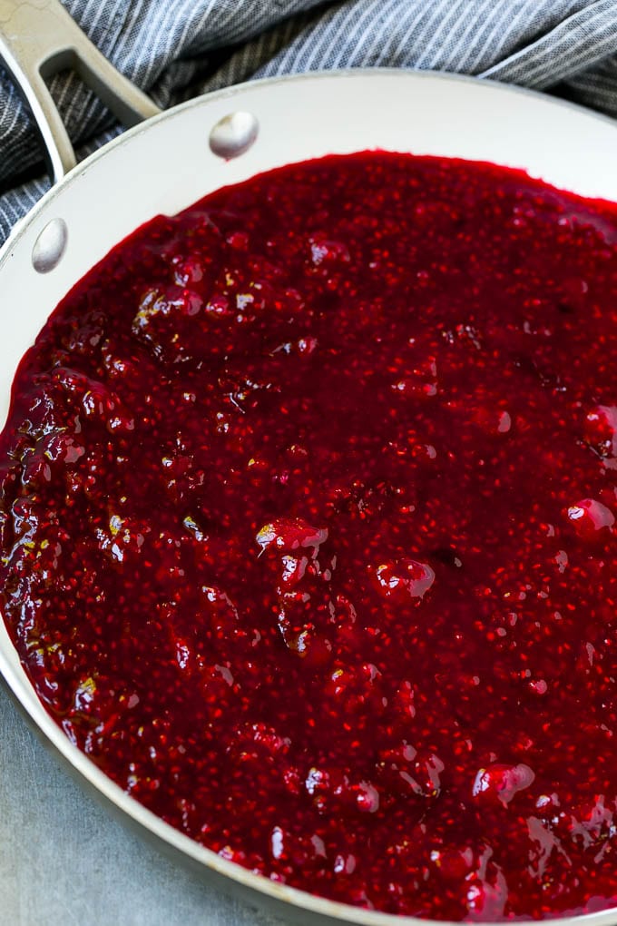 Raspberry Sauce Recipe | Homemade Raspberry Sauce | Raspberry Recipe #raspberries #dessert #sraye Berries cooked in a skillet.