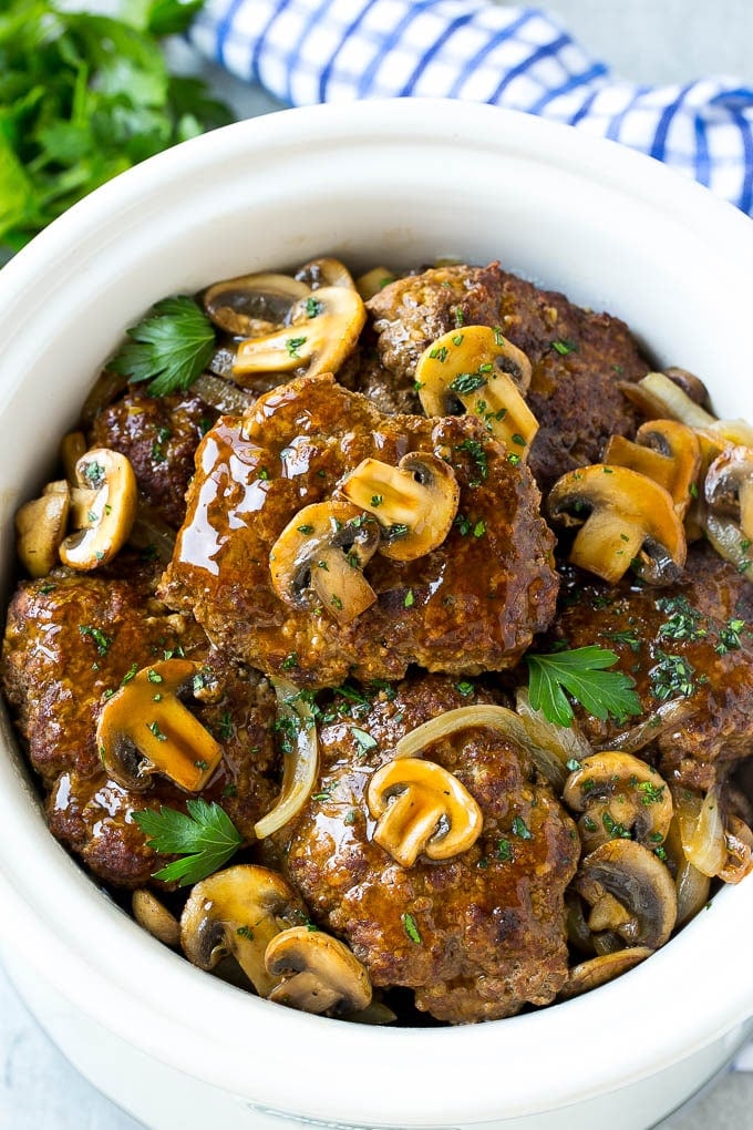 Slow Cooker Salisbury Steak Recipe | Homemade Salisbury Steak | Salisbury Steak from Scratch #steak #beef #salisbury #salisburysteak #slowcooker #crockpot #dinner #sraye Slow cooker salisbury steak with mushroom, gravy and onions.