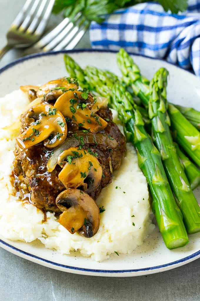 Slow Cooker Salisbury Steak Recipe | Homemade Salisbury Steak | Salisbury Steak from Scratch #steak #beef #salisbury #salisburysteak #slowcooker #crockpot #dinner #sraye Slow cooker salisbury steak with mushroom gravy over mashed potatoes.