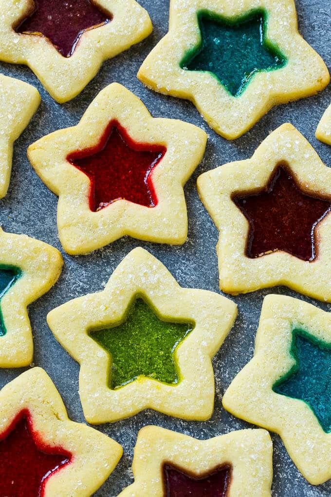 Stained Glass Cookies | Stained Glass Window Cookies | Christmas Cookies | Sugar Cookies | Holiday Cookies #cookies #stainedglasscookies #sugarcookies #christmascookies #christmas #holiday #dessert #sraye Stained glass window cookies in various colors.