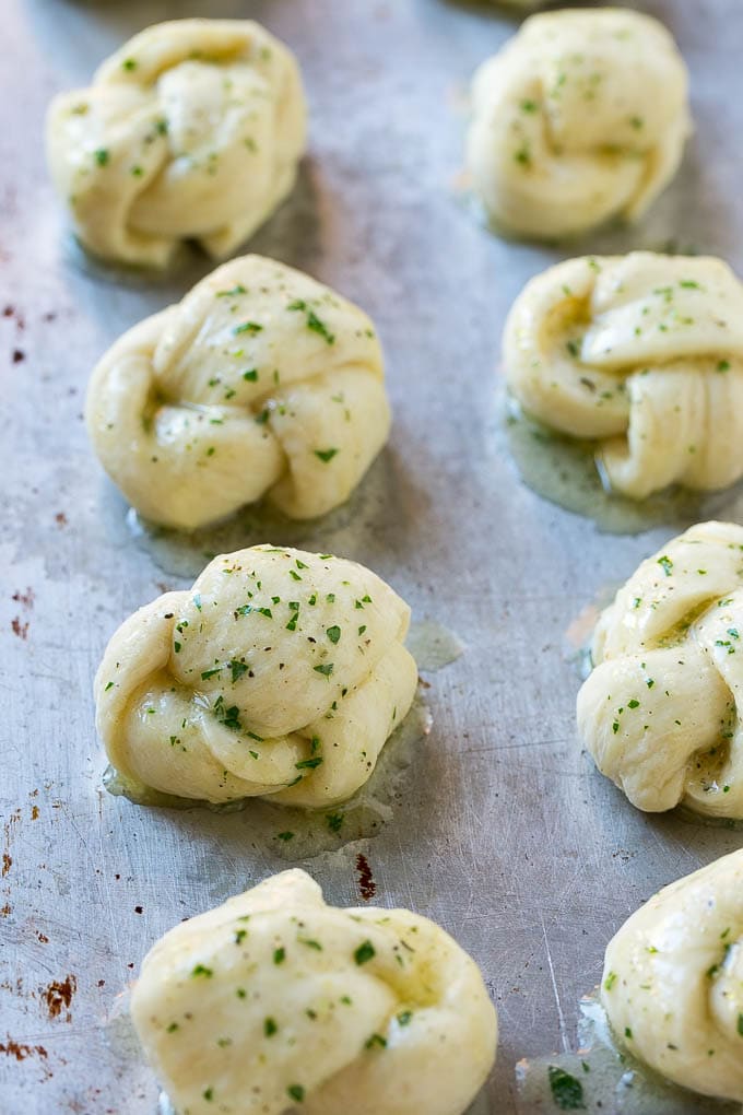 Garlic Knots Recipe | Garlic Rolls | Garlic Butter Rolls | Garlic Bread Recipe #garlic #garlicbread #garlicknots #breadsticks #sraye Dough brushed with butter, herbs and parmesan for extra flavor.