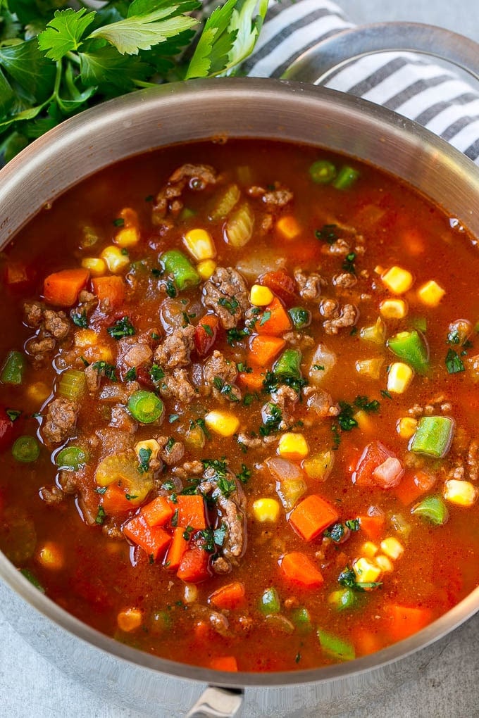 Hamburger Soup Recipe | Hamburger Stew | Ground Beef Soup #hamburger #soup #groundbeef #stew #dinner #sraye A pot of hamburger soup filled with cooked ground beef, veggies and seasonings.