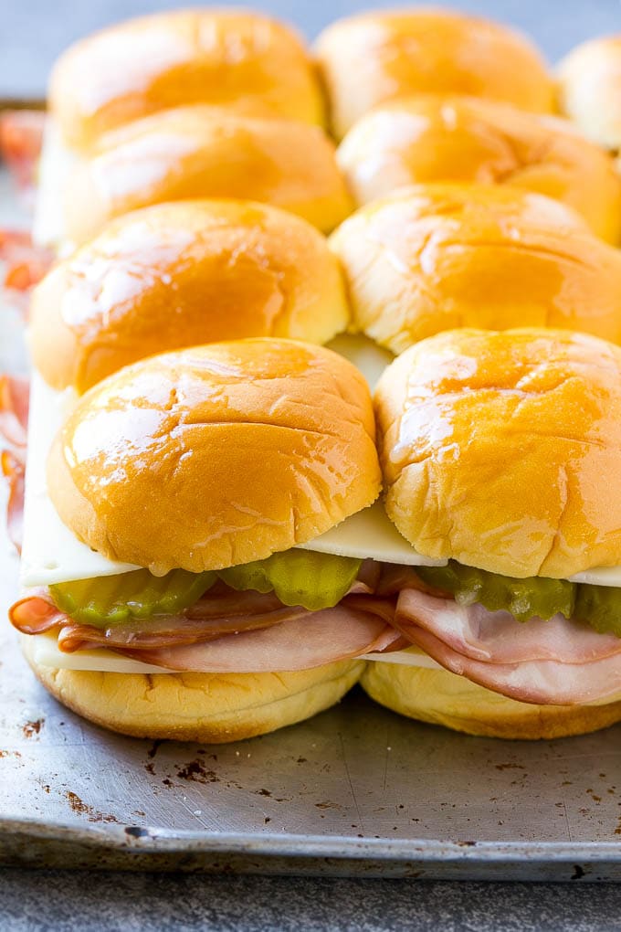 Cuban Sliders Recipe | Cuban Sandwich Recipe | Slider Sandwiches | Ham and Cheese Sliders #sliders #sandwiches #ham #cheese #appetizer #sraye Assembled slider sandwiches ready to go into the oven.