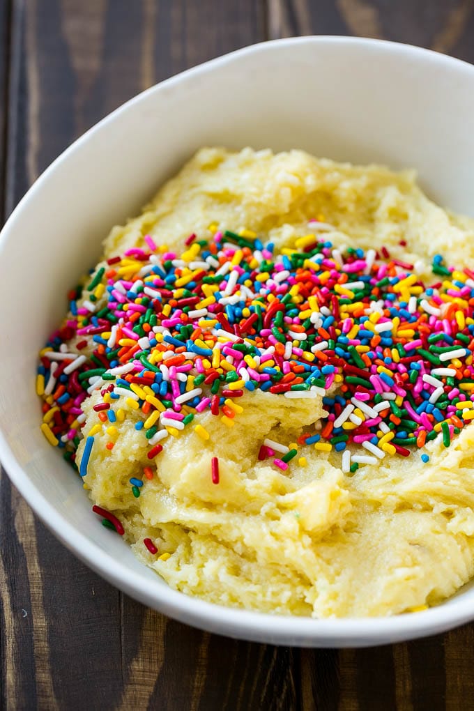Funfetti Cookies Recipe | Funfetti Cake Mix Cookies | Sprinkle Cookies | Cake Mix Cookies #cookies #funfetti #sprinkles #dessert #sraye Cookie dough in a bowl with sprinkles on top.