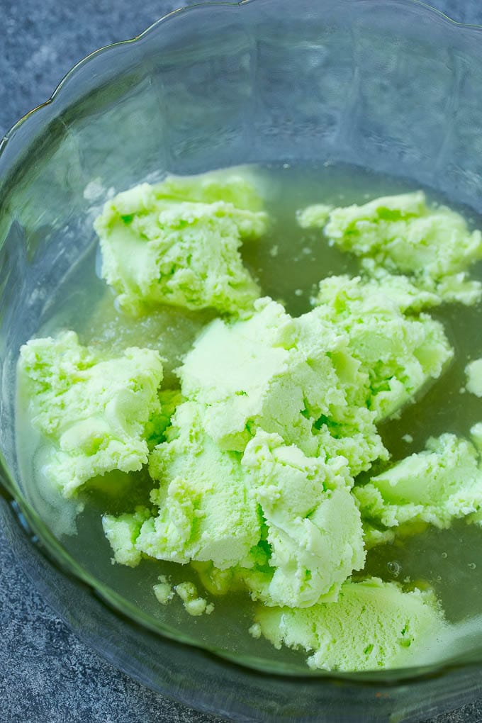 Lime Sherbet Punch | Party Punch Recipe | Sherbet Punch Recipe | Limeade Recipe #sherbet #punch #lime #drink #sraye A bowl with limeade concentrate and sherbet in it.