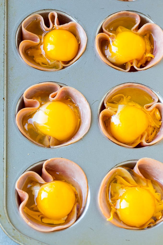 Ham and Egg Cups Recipe | Low Carb Breakfast | Ham and Eggs #ham #eggs #lowcarb #breakfast #sraye Ham pressed into muffin tins and topped with eggs and cheese.