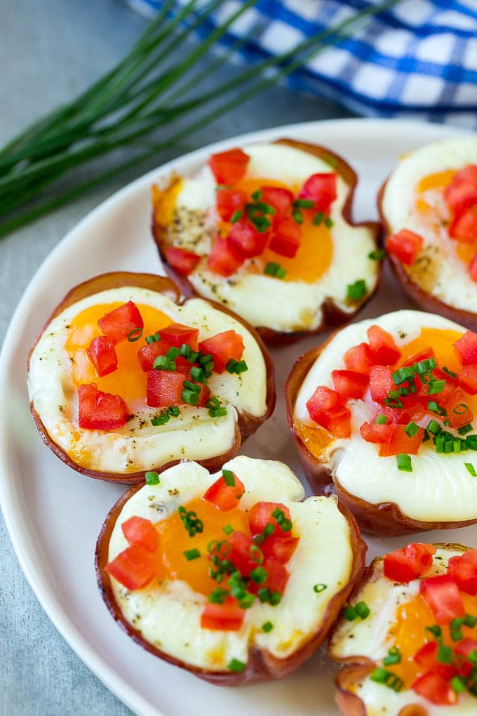 Ham and Egg Cups Recipe | Low Carb Breakfast | Ham and Eggs #ham #eggs #lowcarb #breakfast #sraye A plate of ham cups filled with eggs and cheese.