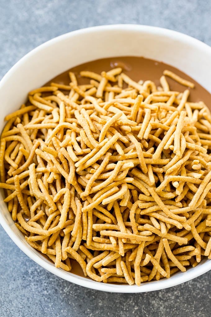 Haystack Cookies Recipe | No Bake Cookies | Chow Mein Noodle Cookies #nobakecookies #cookies #recipe #chocolate #sraye A bowl of melted chocolate and chow mein noodles.