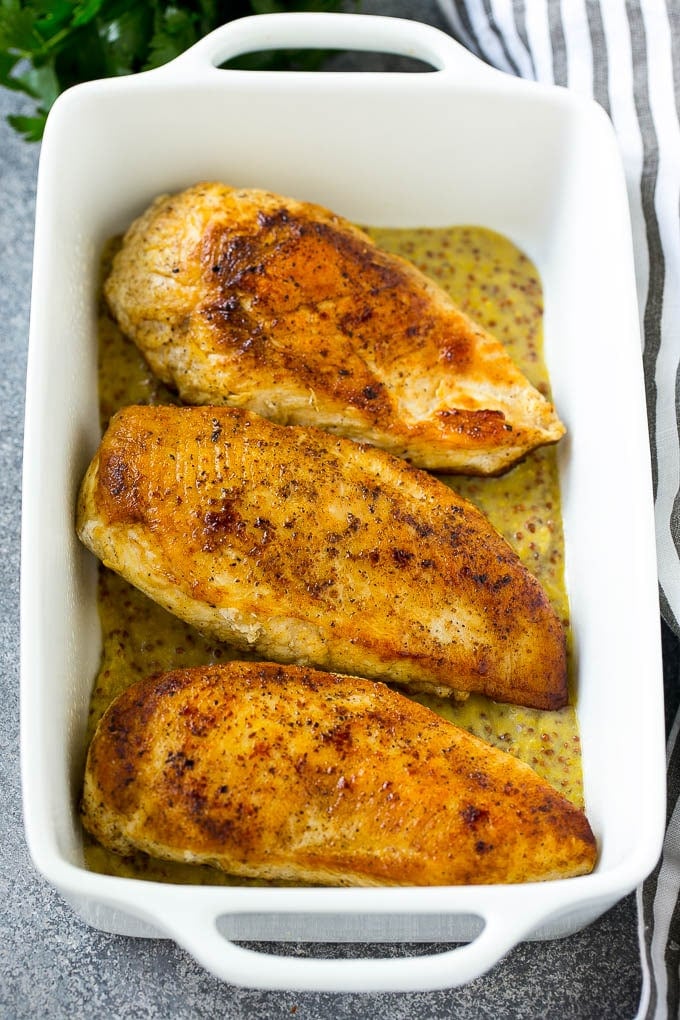Honey Mustard Chicken Recipe | Baked Chicken Recipe | Easy Chicken Recipe #chicken #dinner #sraye Seared chicken breasts in a baking dish.