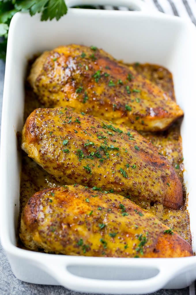 Honey Mustard Chicken Recipe | Baked Chicken Recipe | Easy Chicken Recipe #chicken #dinner #sraye Baked honey mustard chicken garnished with chopped parsley.
