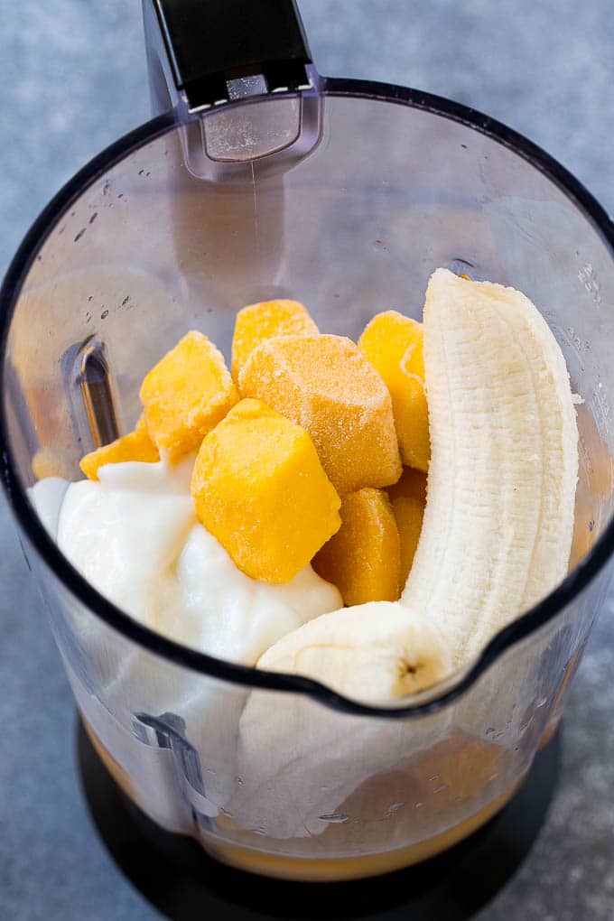 Mango Smoothie Recipe | Mango Recipe | Healthy Smoothie #mango #smoothie #drink #sraye Fruit, yogurt and juice in a blender.