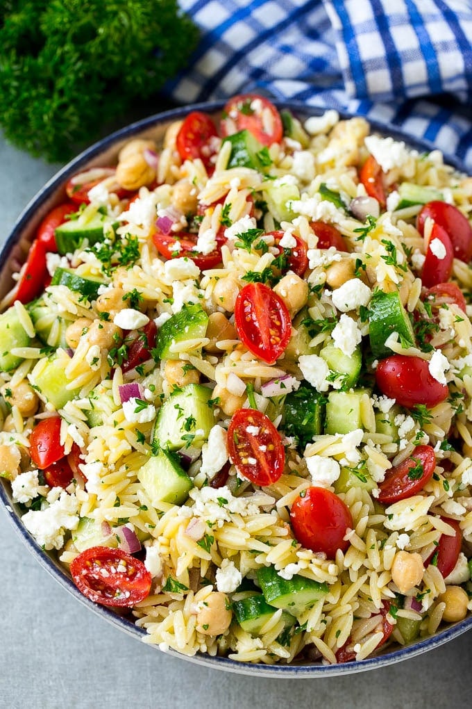 Orzo Salad Recipe | Orzo Pasta Salad | Greek Orzo Salad | Mediterranean Orzo Salad #pastasalad #orzo #greekfood #salad #sraye Greek orzo salad with pasta, cucumbers, tomatoes and feta cheese.