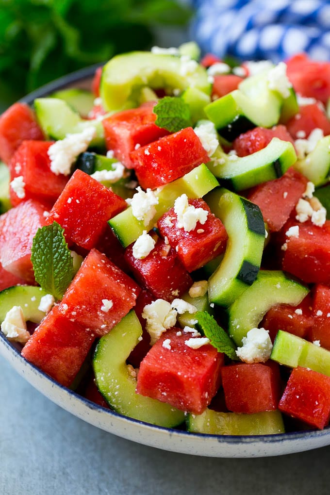 Watermelon Salad Recipe | Watermelon Feta Salad | Watermelon Cucumber Salad #watermelon #cucumber #salad #sraye Watermelon salad with cucumbers, feta cheese and mint in a serving bowl.