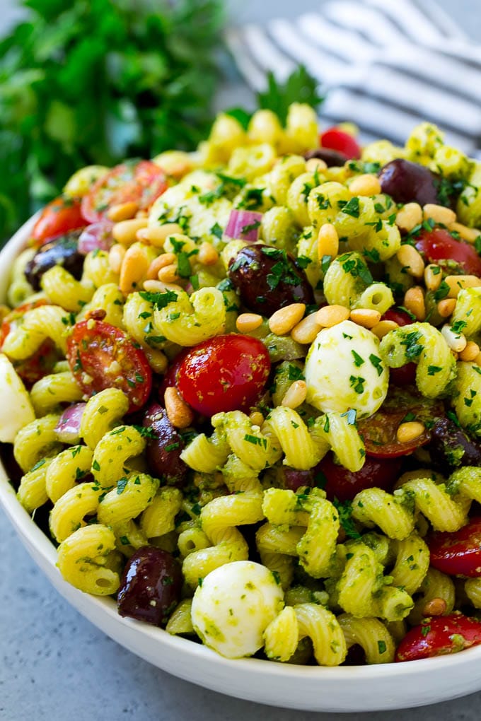 Pesto Pasta Salad | Italian Pasta Salad | Easy Pasta Salad #pasta #salad #pesto #olives #tomatoes #sraye Pesto pasta salad with tomatoes, olive and fresh mozzarella.