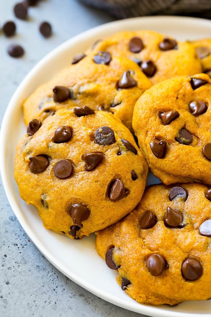Pumpkin Chocolate Chip Cookies Recipe | Pumpkin Cookies | Pumpkin Chocolate Cookies #pumpkin #cookies #chocolate #baking #fall #sraye #dessert A plate of pumpkin chocolate chip cookies.