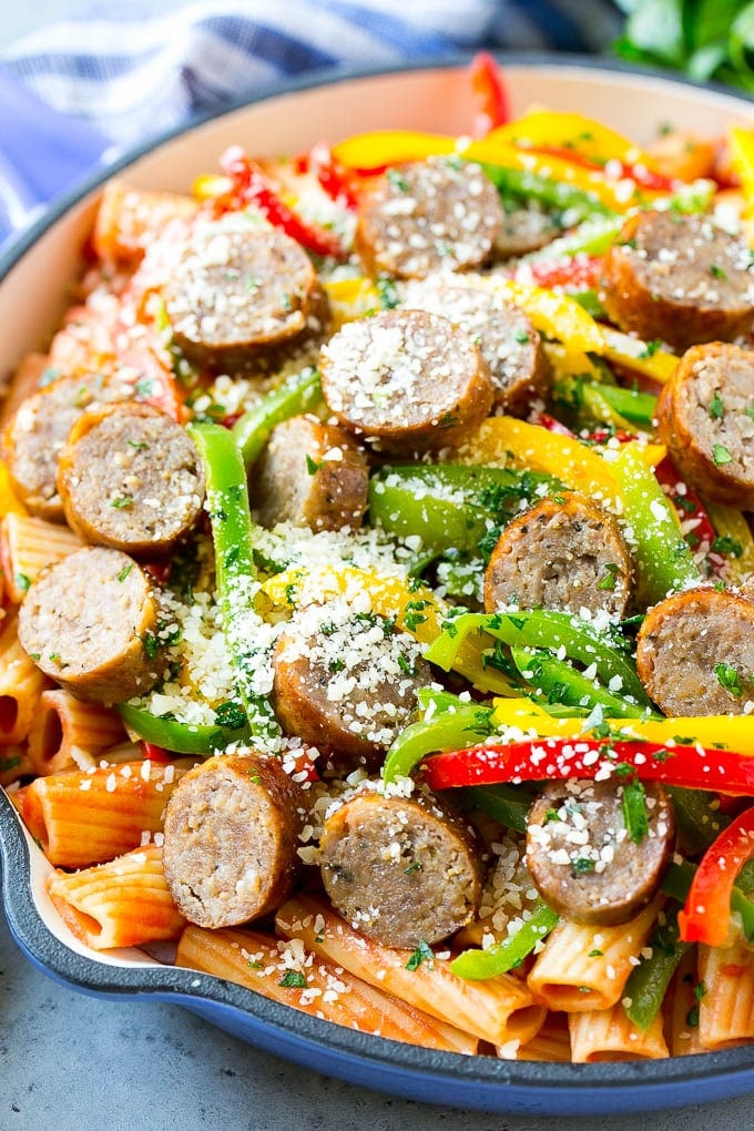 Sausage and Pepper Pasta Recipe | Italian Sausage Recipe | Sausage and Peppers | Easy Pasta #pasta #sausage #peppers #dinner #sraye Sausage and pepper pasta with sliced Italian sausage, red and yellow bell peppers and grated parmesan cheese.