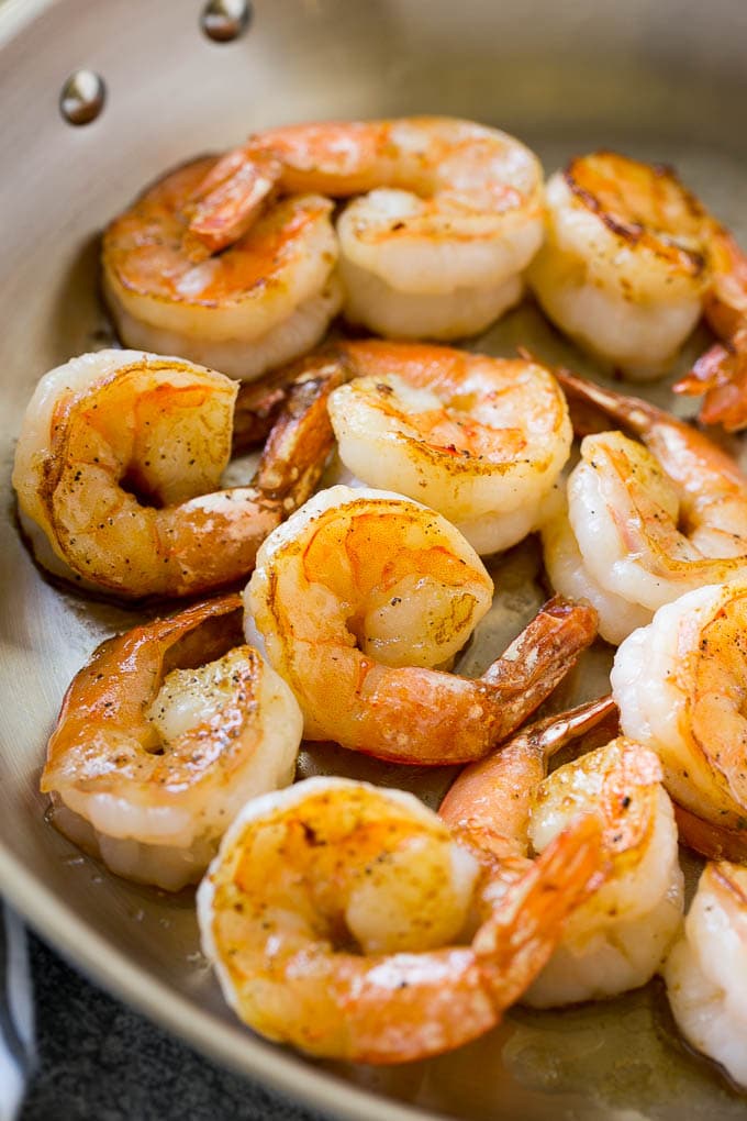 Shrimp Alfredo Recipe | Shrimp Alfredo Pasta | Shrimp Fettuccine Alfredo #shrimp #pasta #italianfood #sraye Seared shrimp in butter, in a skillet.