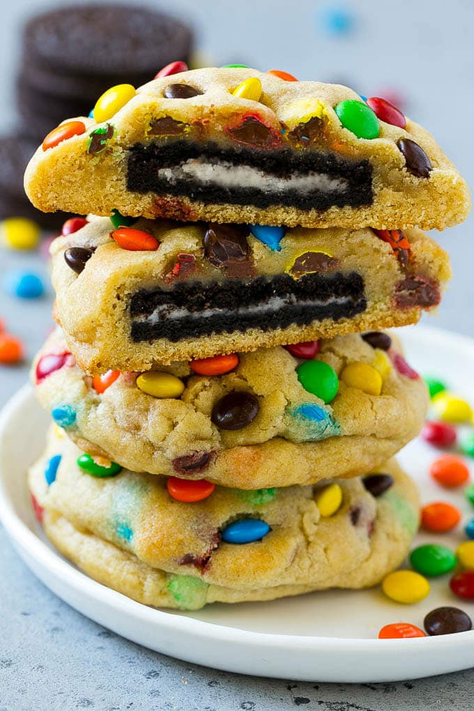 Oreo Stuffed Cookies Recipe | M&M's cookies | Stuffed Cookies #cookies #chocolate #oreos #dessert #baking #sraye A stack of Oreo stuffed cookies on a plate.